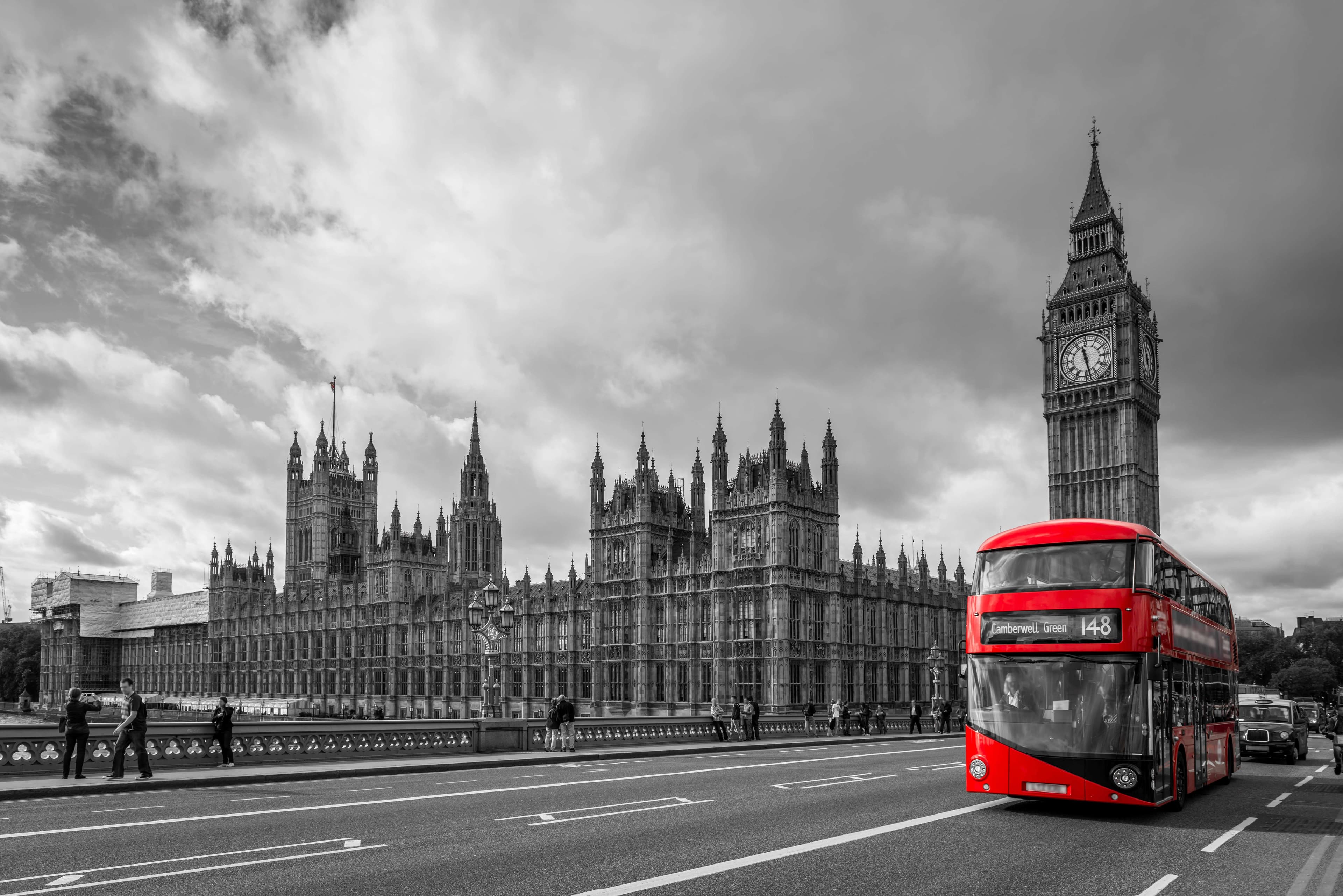 Iconic London street scene with Big Ben and a red double-decker bus